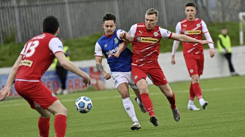 Cliftonville&#39;s Chris Curran and Linfield&#39;s Jordan Stewart challenge for the ball during Saturday&#39;s Danske Bank Premiership match at Solitude 					Picture: Colm Lenaghan/Pacemaker .. 