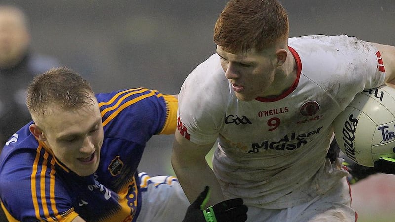 Tyrone&#39;s Cathal McShane, up against Tipperary&#39;s Kevin Fahey during the All-Ireland U21 Football Final. Pic: Philip Walsh 