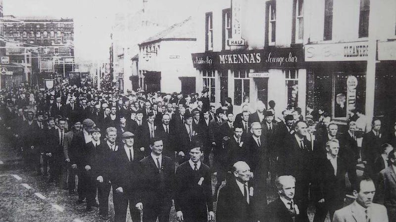 This picture showing republicans marching along the Falls Road in 1966 