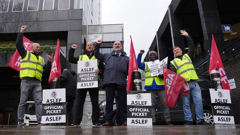 Aslef general secretary Mick Whelan (centre) on the picket line at Euston train station in London, as members of train drivers union are launching a wave of fresh walkouts in a long-running dispute over pay.