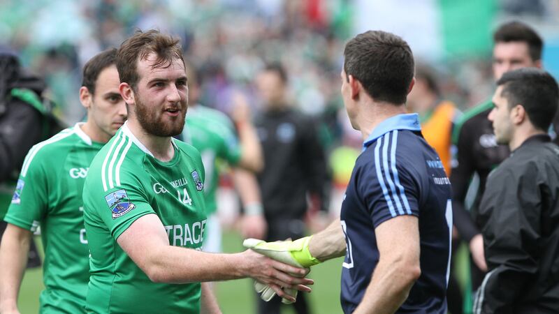 Fermanagh's Se&aacute;n Quigley shakes hands with Dublin 'keeper Stephen Cluxton at the end of Sunday's All-Ireland SFC quarter-final<br />Picture: Colm O'Reilly &nbsp;
