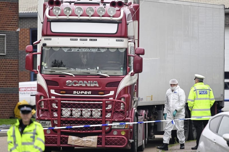 Police examining a lorry in Essex where 39 people were found dead yesterday. Picture by Stefan Rousseau, Press Association 