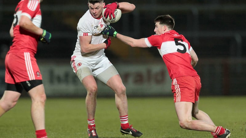Richie Donnelly, centre, was outstanding in Tyrone's 2-15 to 0-12 win against Derry on Saturday evening at Healy Park