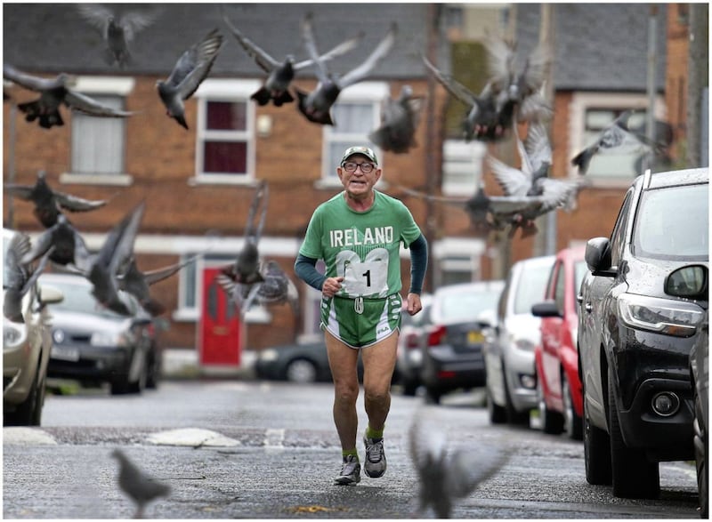 Octogenarian Francie Arthurs taking part in the Gaeltacht Quarter 10k race in west Belfast. Picture by Mal McCann&nbsp;