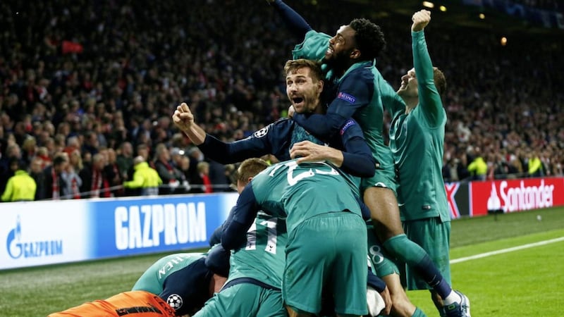 Tottenham players celebrate after Lucas Moura&#39;s hat-trick goal had sent them into the Champions League final 