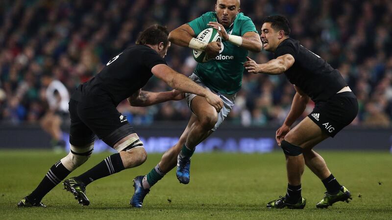 Ireland's Simon Zebo takes on New Zealand's Anton Lienert-Brown (right) and Liam Squire during last Saturday's autumn international at the Aviva Stadium<br />Picture by PA
