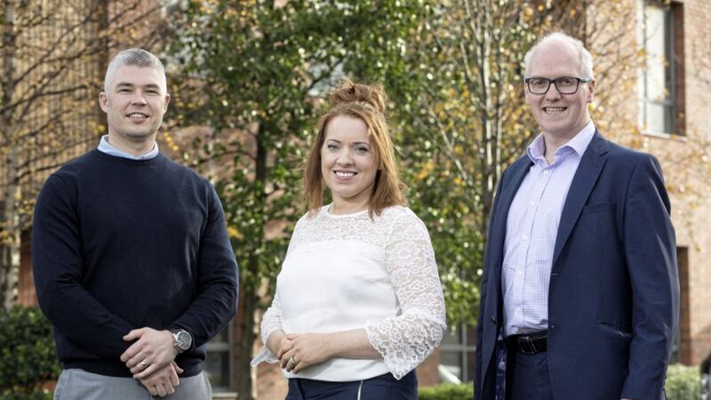 Pictured at the Cundall Belfast office are: Chris McAnearney, associate; Yvonne McNally, mechanical associate; and Tom&aacute;s Neeson, global managing partner 