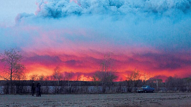 A wildfire moves towards the town of Anzac from Fort McMurray, Alberta, on Wednesday PICTURES: Jason Franson/The Canadian Press via AP&nbsp;