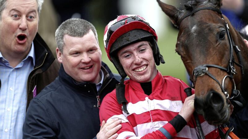 Trainer Gordon Elliott and jockey Jack Kennedy (right) after winning the Boodles Fred Winter Juvenile Handicap Hurdle on Veneer of Charm. The trainer landed a treble on the day, while Kennedy bagged a double 