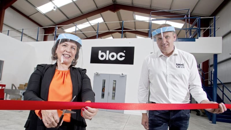 Economy minister Diane Dodds officially opens the new PPE manufacturing facility at Bloc Blinds in Magherafelt last week, watched by the firm&#39;s managing director Cormac Diamond. Photo: Steven McAuley/McAuley Multimedia 