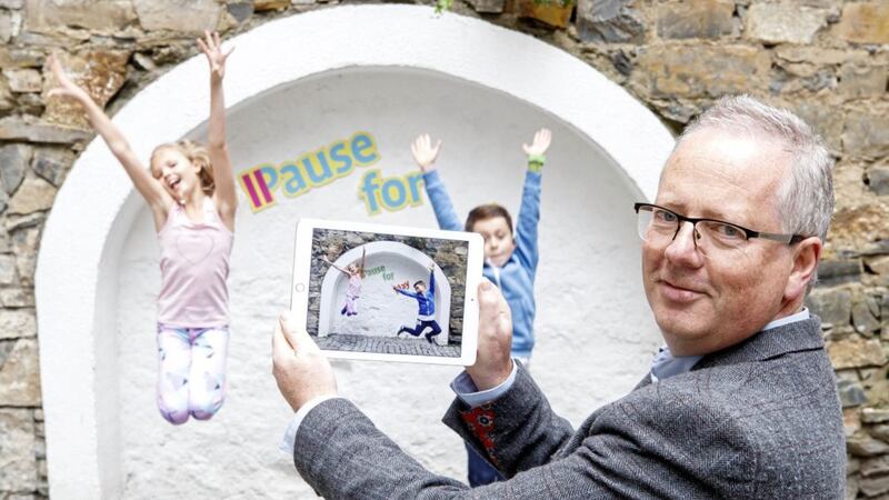 Psychologist Conor Owens gets some help encouraging families to pause for play 