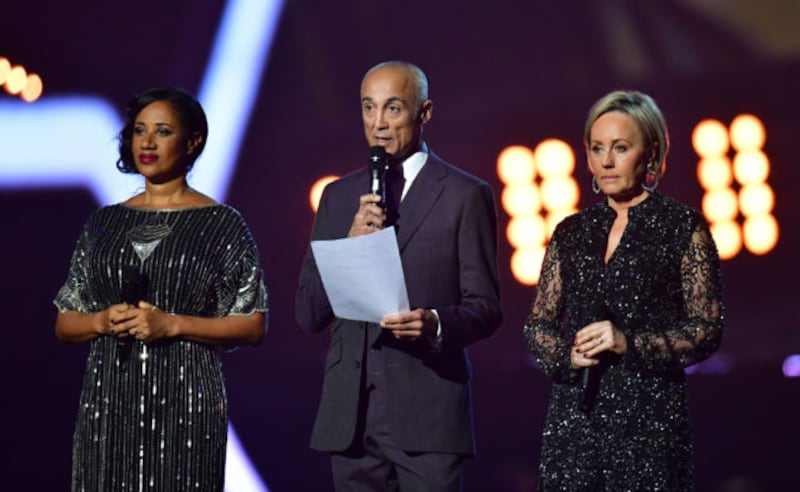 Helen Pepsi DeMacque, Andrew Ridgeley and Shirley Holliman give a tribute on stage to George Michael at the Brit Awards (Dominic Lipinski/PA)