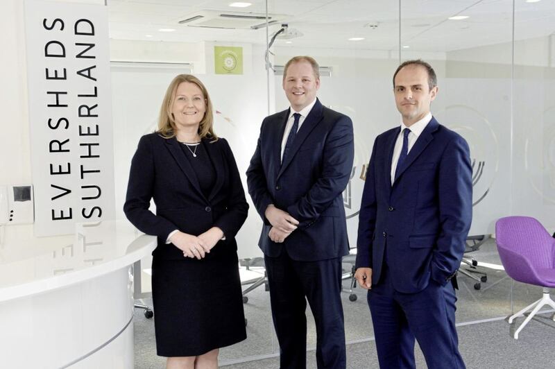 Eversheds Sutherland Belfast partners Lisa Bryson, Gareth Planck and Matthew Howse at the firm's new Belfast city centre offices. 