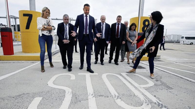 Taoiseach Leo Varadkar (third left) and European Affairs Minister Helen McEntee (left) with port and customs officials during a visit to new physical infrastructure at Dublin Port. Picture by Brian Lawless, Press Association 