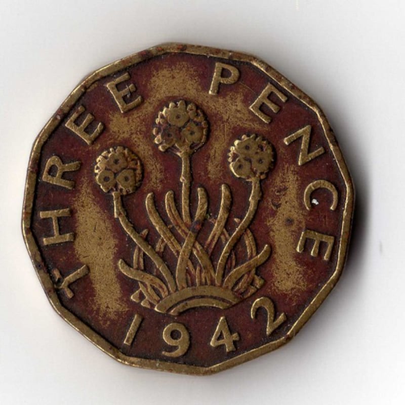 Three pence coin.