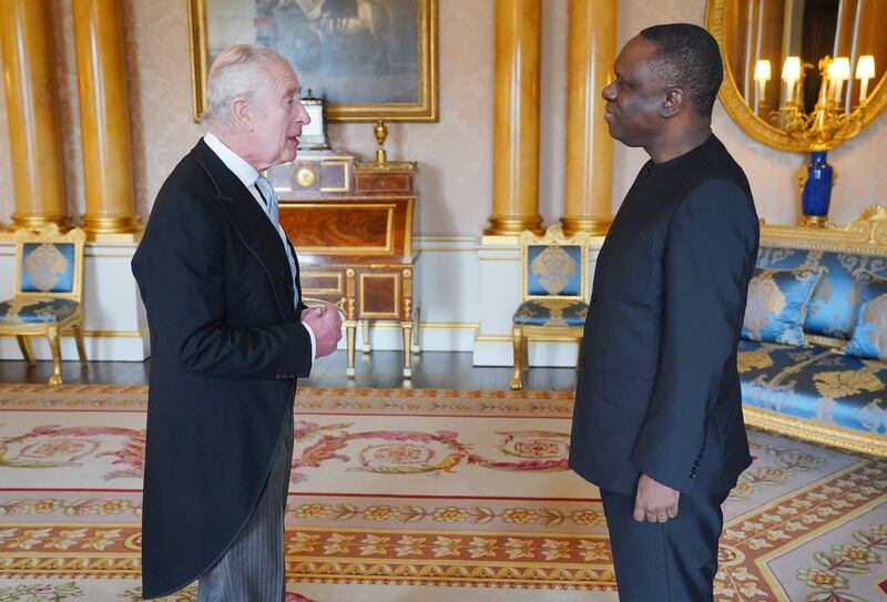 The King welcomes Tanzania’s new High Commissioner to the UK, Mbelwa Kairuki, at Buckingham Palace