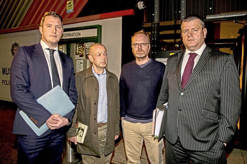 Niall Murphy with John Finucane and investigative journalists Barry McCaffrey and Trevor Birney in 2018. Picture by Liam McBurney/PA 