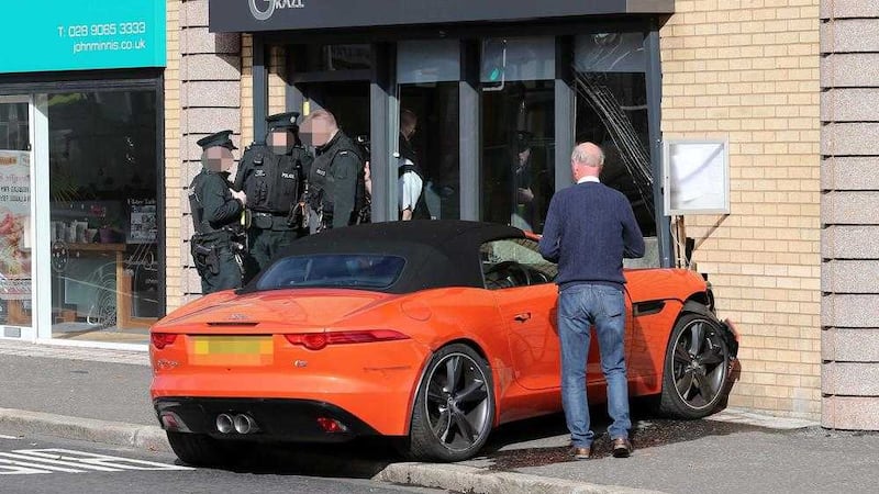The scene of an accident on the Upper Newtownards Road in east Belfast where a Jaguar car crashed into the Graze restuarant. Picture Mal McCann. 