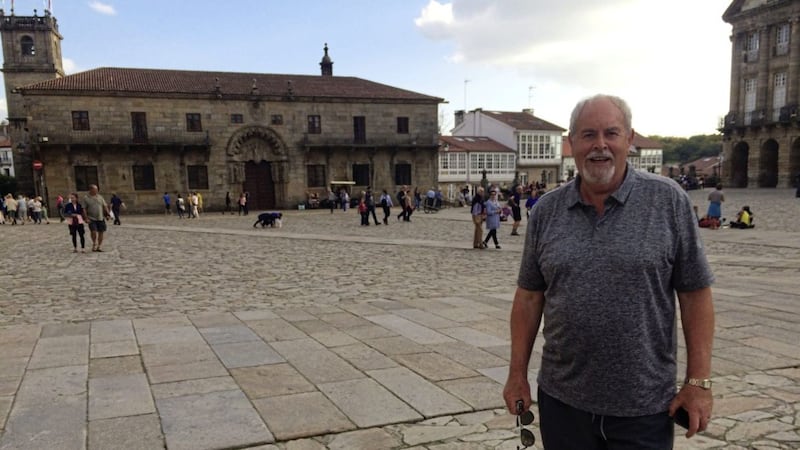Gerry Kelly reaches Santiago, having walked the final part of the Camino 