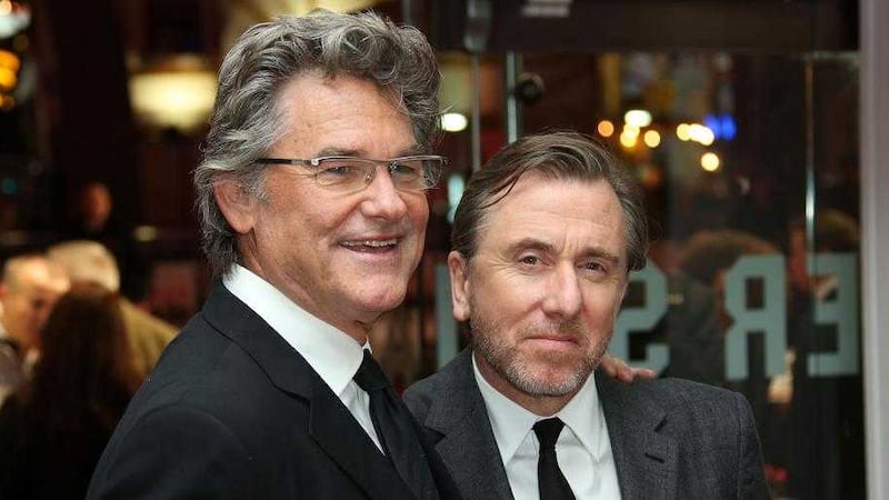 Kurt Russell, left, and Tim Roth pose for photographers upon arrival at the premiere of the film &#39;The Hateful Eight&#39; in London, Thursday, Dec. 10, 2015. (Photo by Joel Ryan/Invision/AP) 