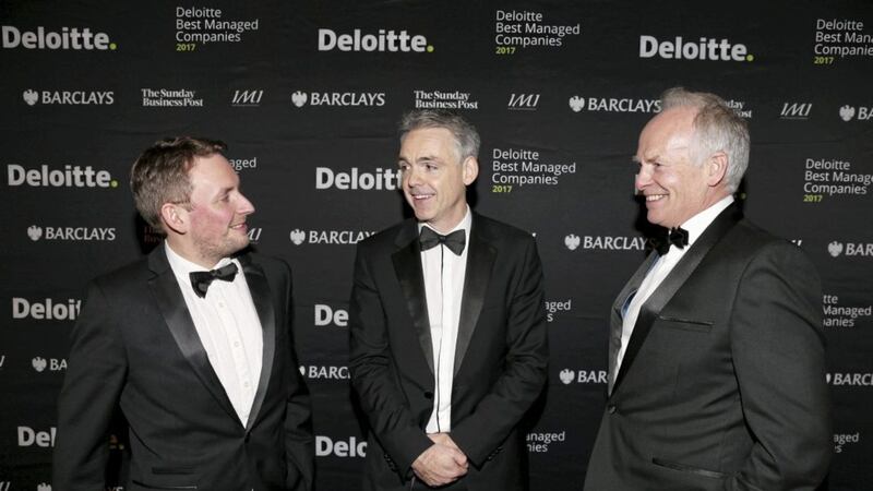 Deloitte partner Glenn Roberts (centre) is joined at the Deloitte Best Managed companies awards by Steven Creighton from Neueda Consulting and Ian Wilson from Seopa, who were included on the list for the first time 