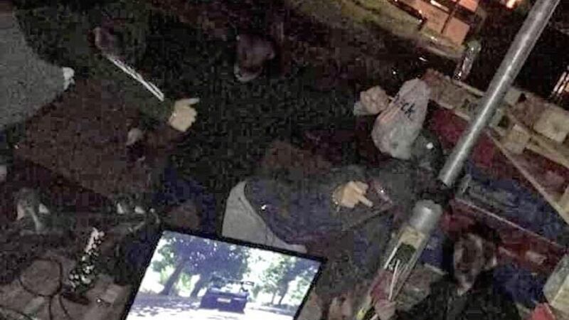A photograph posted on social media showed a gang with a TV and Xbox wired into a street light 