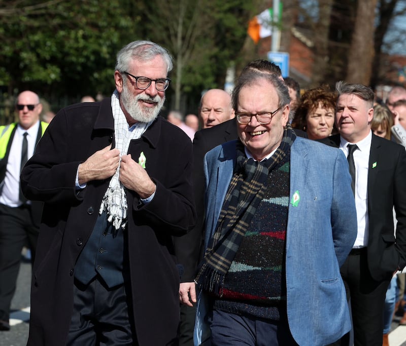 Former Sinn Féin president Gerry Adams and former west Belfast councillor Tom Hartley pictured in Sunday's parade. PICTURE: MAL MCCANN