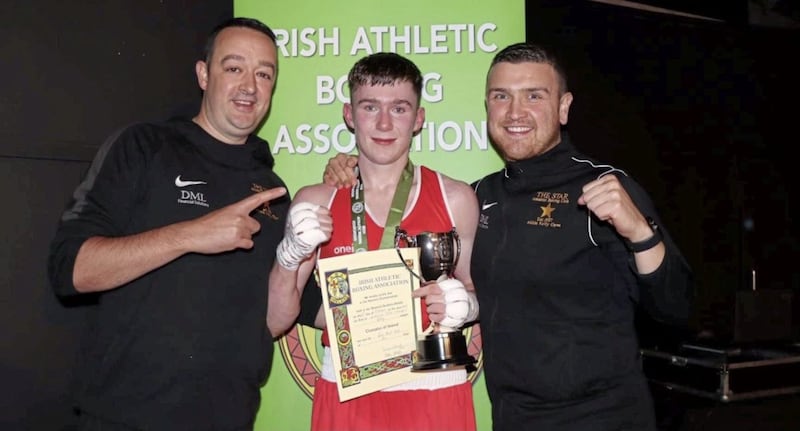 Irish Elite 60kg champion JP Hale with star coaches Barry McMahon (left) and Liam Corr 