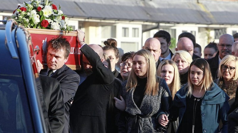 Family and friends follow the coffin of Jamie Burns as it leaves the family home in York Drive yesterday. Picture by Bill Smyth 