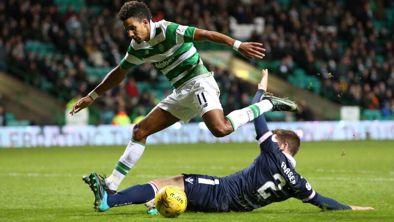 Celtic's Scott Sinclair is tackled by Ross County's Marcus Fraser during the Ladbrokes Scottish Premiership match at Celtic Park&nbsp;