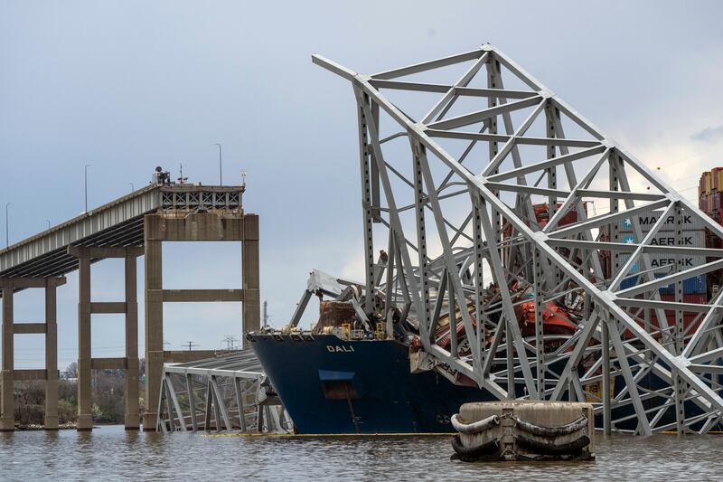 Six workers died when the bridge collapsed in the early hours (Kaitlin Newman/The Baltimore Banner via AP)