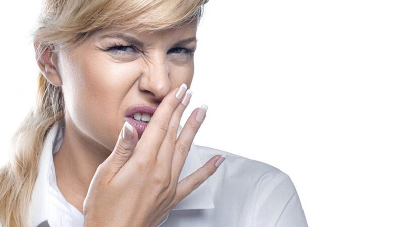 Impacted wisdom teeth can produce a similar putrid smell on the breath 