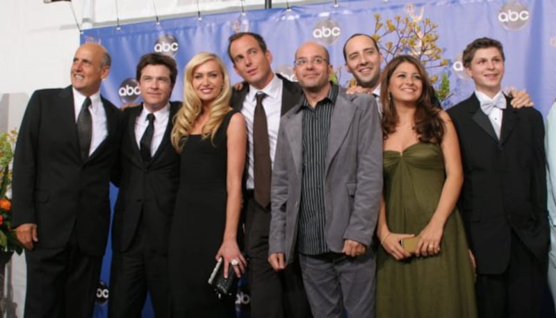 Portia de Rossi (third from left) with the cast of the Emmy award-winning television series Arrested Development 