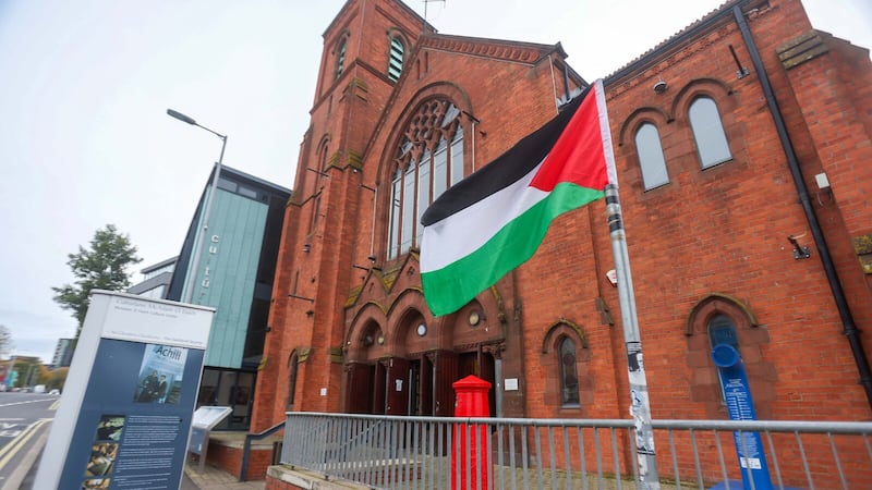 A Palestinian flag flies outside the Cultúrlann on Belfast's Falls Road. Picture by Mal McCann