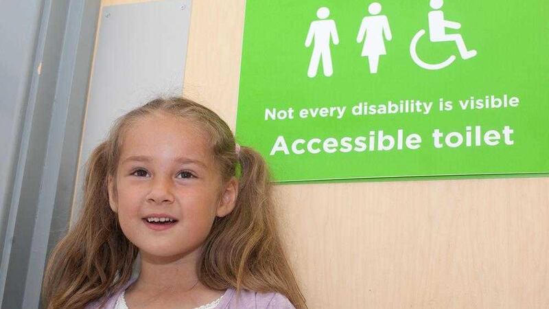 Five year old Evalynn Glennester-West welcomes the new accessible toilets at her local supermarket 
