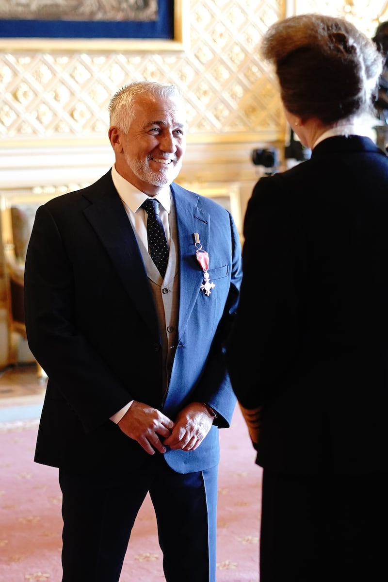 Paul Hollywood smiles as he talks to the Princess Royal during the ceremony
