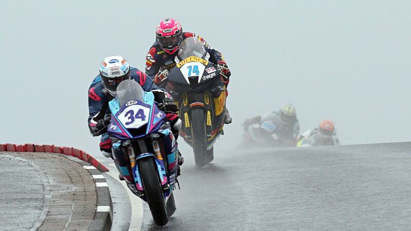 Alastair Seeley leads Davey Todd during the Thursday evening Strain Engineering Supersport race at the North West 200 on Thursday night 	                                Picture: Rod Neill<br />&nbsp;