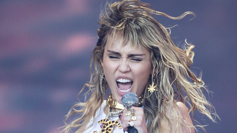 Miley Cyrus performing on the fifth day of the Glastonbury Festival
