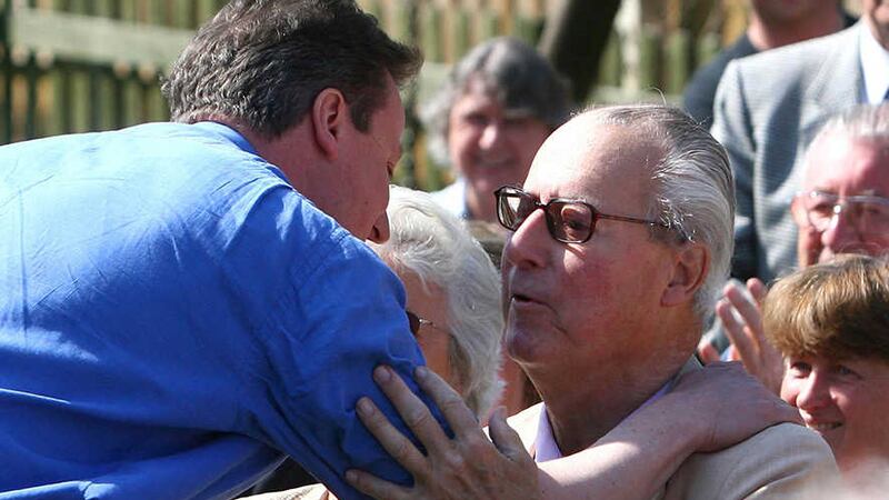 File photo dated 18/4/2010 of David Cameron greeting his father Ian. The British prime minister's late father was reported to be among names - including those of six peers, three ex-Tory MPs and political party donors - named in relation to investments set up by Panamanian law firm Mossack Fonseca&nbsp;