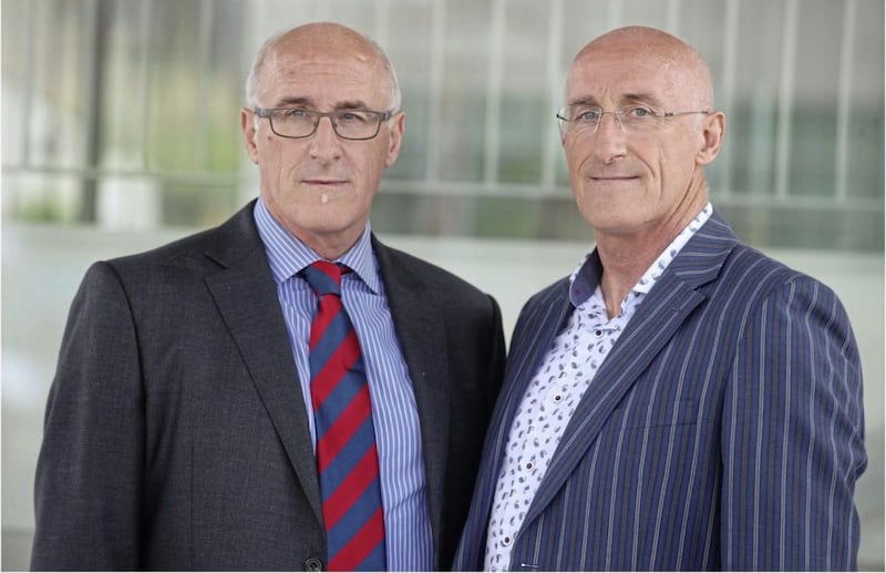 Nigel Hamilton, left, with twin brother Simon at the Infected Blood Inquiry in Belfast. Picture by Hugh Russell 