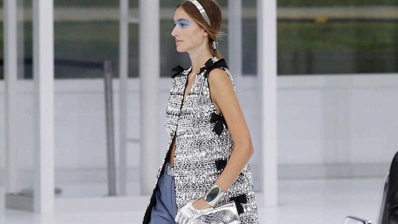 A model wearing a creation for Chanel&#39;s Spring-Summer 2016 ready-to-wear fashion collection presented during the Paris Fashion Week 