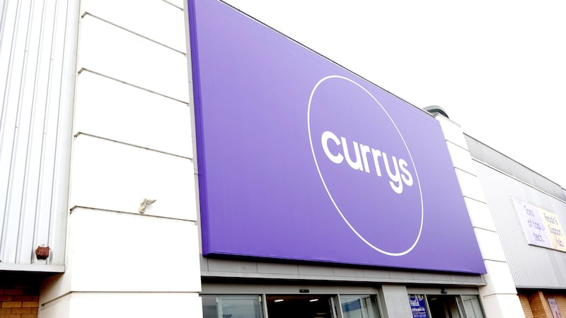 Currys sign on a shop front.