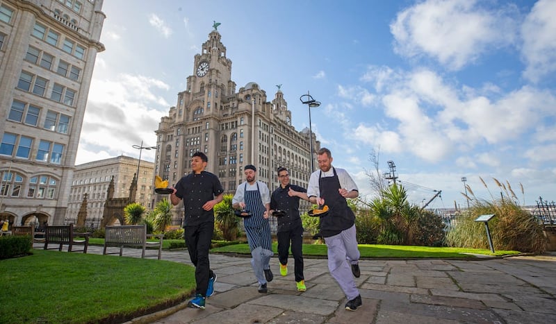 Mauricio Ortegon, Chris Rushton, Jehu Cuello and Adam Gibson take part in the chefs race in Liverpool