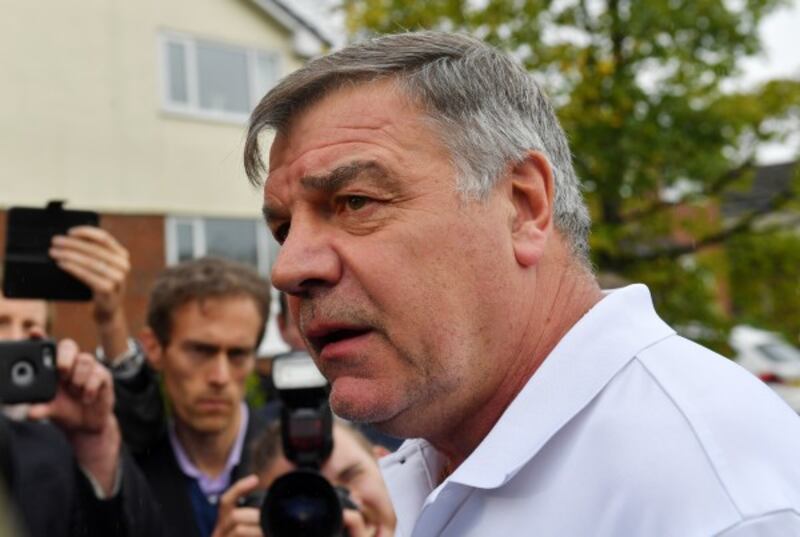 Sam Allardyce speaks to the media outside his home in Bolton.