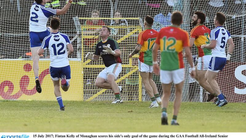 Fintan Kelly palms home the clinching goal for Monaghan at Netwatch Park