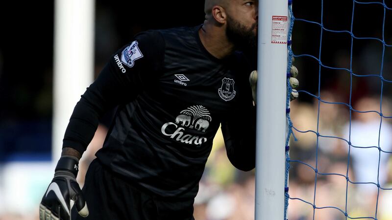 Everton goalkeeper Tim Howard kisses the goal post after his final game at Goodison Park in Sunday's Premier League match against Norwich<br />Picture by PA&nbsp;