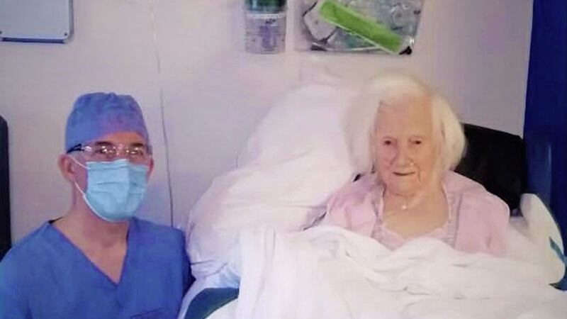 Madge Martin, pictured alongside Bruce Watson, consultant orthopaedic surgeon. Picture by Southern Health and Social Care Trust/ Facebook 