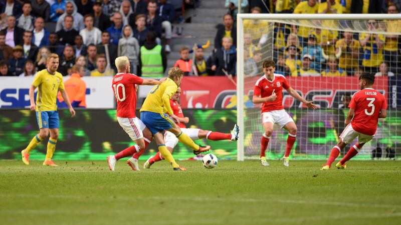 Sweden's Emil Forsberg scores his side's first goal in Sunday's international friendly against Wales at the Friends Arena in Stockholm<br />Picture by AP&nbsp;