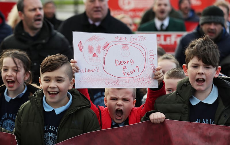 Irish language act campaigners, including pupils from Irish-medium schools across the north, take part in a protest at Stormont parliament buildings in Belfast, ahead of a meeting with Secretary of State Karen Bradley&nbsp;