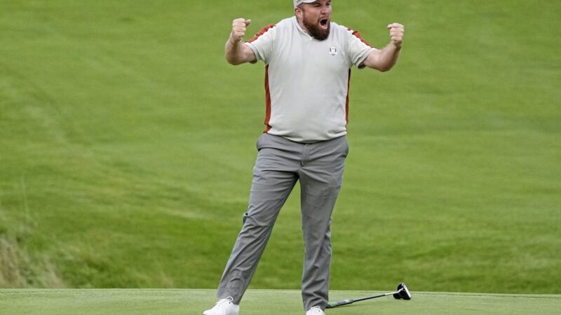 Team Europe&#39;s Shane Lowry celebrates on the 18th hole after HE makes a putt and winning their four-ball match the Ryder Cup at the Whistling Straits Golf Course  on Saturday. Lowry&#39;s form was one of few bright spots on another challenging day for Europe as the USA took a commanding 11-5 lead into Sunday&#39;s singles				 Picture: AP Photo/Charlie Neibergall 